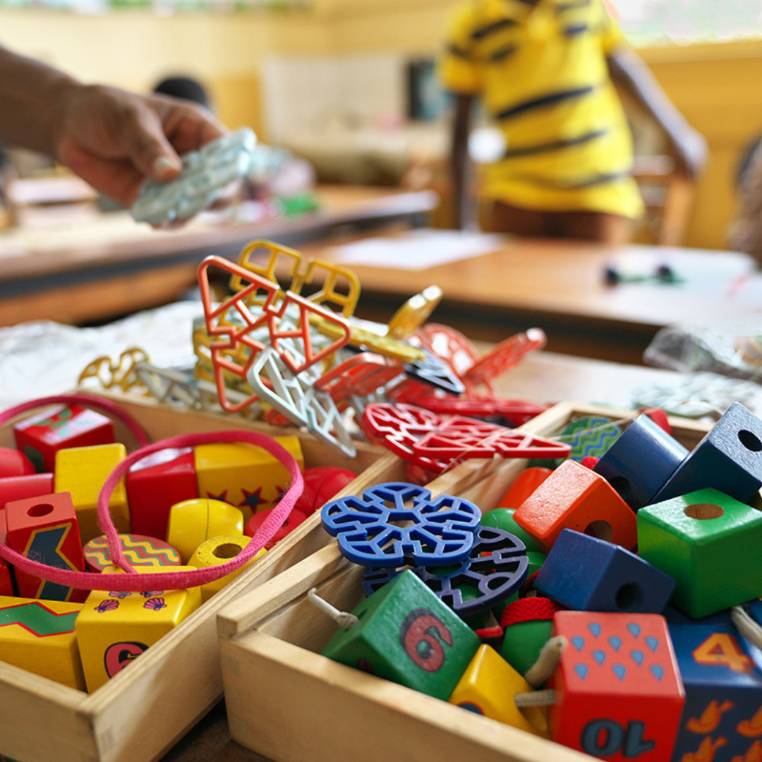 Colourful blocks and educational toys in a classroom.