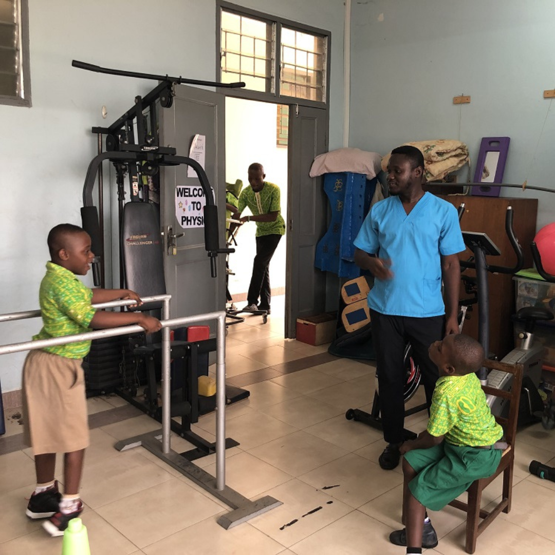 Children learning in the Physiotherapy Room with an instructor.